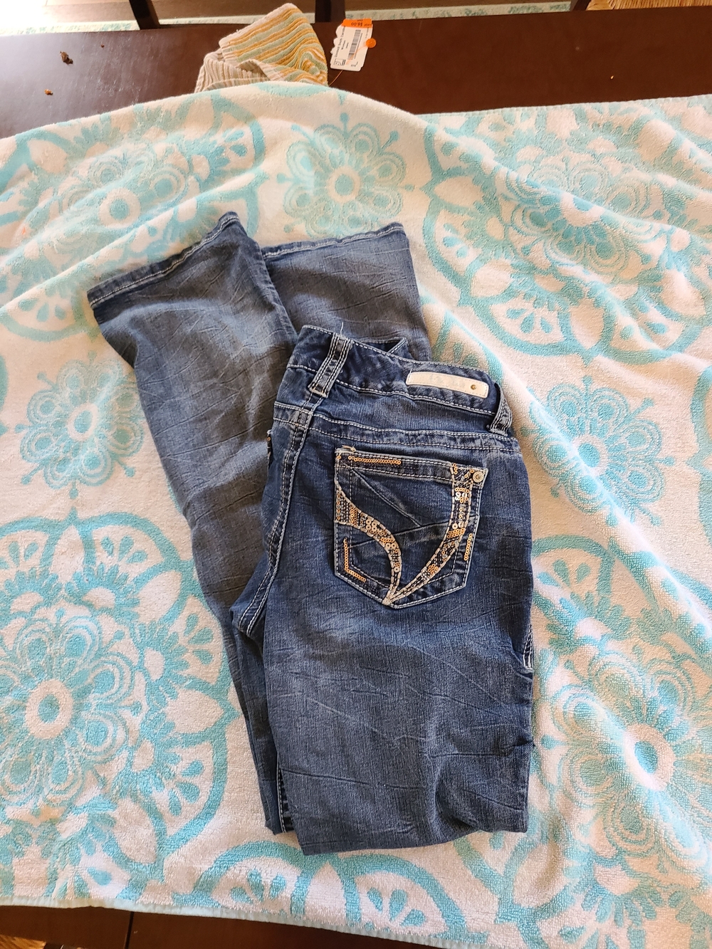 Ariya Dark Blue Boot Cut Jeans with Decorative Back Pocket